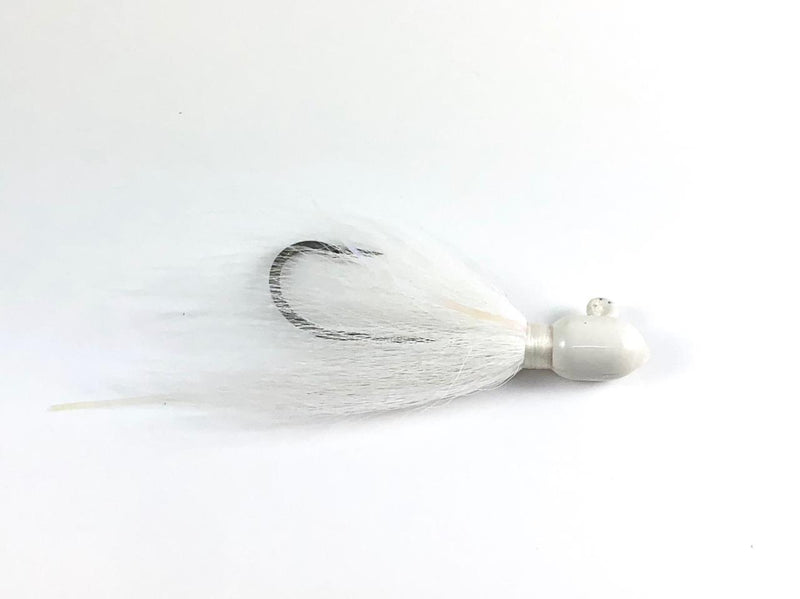 A magictail bullet head bucktail jig in white